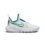 Studio lateral shot of the Nike Flex Runner 2 children's running shoes in Summit White and Stadium Green, highlighting the slip-on bootie design, flexible white foam sole, green Swoosh branding with Just Do It text, and blue heel pull tab.