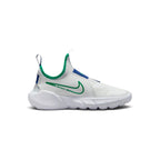 Angled lateral view capturing the sleek silhouette, breathable white mesh forefoot, and vibrant green collar lining.