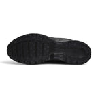 Displays the full-length black rubber outsole, showcasing the multi-pod waffle traction pattern, grooved forefoot flex channels, debossed Nike branding, and BRS 1000 heel rubber badge.