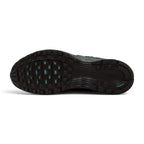 Displays the full-length black rubber outsole, showcasing the multi-pod waffle traction pattern, grooved forefoot flex channels, debossed Nike branding, and subtle teal traction pod insets.