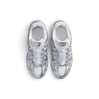 Focuses on the locked-in utility lacing layout, displaying the speed toggle mechanism, elasticated laces, breathable white mesh tongue, padded ankle collars, and insoles printed with classic Nike branding.