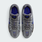 Focuses on the locked-in central lacing layout, displaying the clean symmetry of the grey textile mesh tongues, matching laces, central "BOWERMAN SERIES" ribbon, and vibrant Racer Blue insoles with black Swoosh logos.