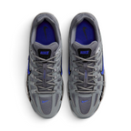 Focuses on the locked-in central lacing layout, displaying the clean symmetry of the grey textile mesh tongues, matching laces, central "BOWERMAN SERIES" ribbon, and vibrant Racer Blue insoles with black Swoosh logos.