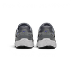 Focuses on the rear profile, highlighting the structured grey synthetic heel counters stamped with Racer Blue micro-Swooshes and blue "P-6000" branding, sitting above the wide white foam midsole base.