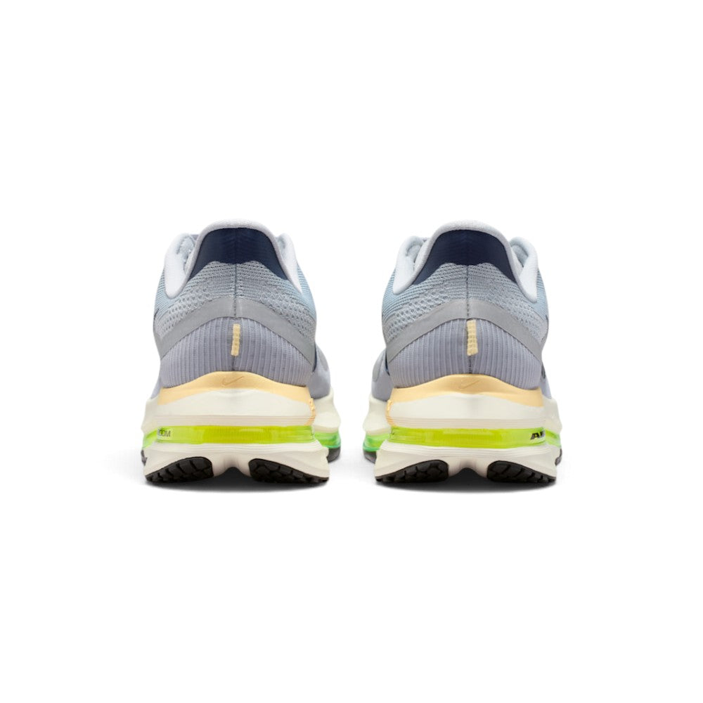 Showing the structured rear heel counter construction, detailing the springy ReactX foam heel crash pad, dual reflective vertical accents, internal supportive heel cup, and bevelled 10mm-drop geometry.