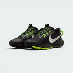 Emphasises the forward-leaning, athletic trail stance of the shoes, showcasing the professional harmony of the bold neon volt accents, the grey phantom midsole, and the tough black toe cap wraps.