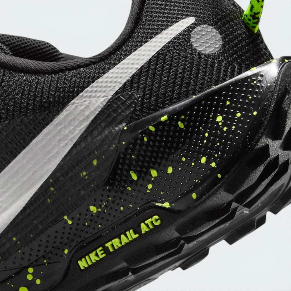 Highlights the "unreal" clean finish where the soft, ground-connecting foam midsole carrier securely bonds to the high-friction, generative rubber trail tread below.