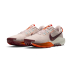 Emphasising the low-cut, aggressive off-road stance of the trainers and the professional color harmony of the Silt Red uppers sitting cleanly above the Sail and Hyper Crimson ReactX foam midsoles.