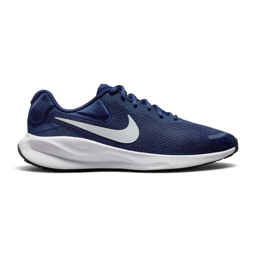 Highlights the lateral silhouette showing the Midnight Navy engineered knit upper, crisp white Nike Swoosh, sculptured white foam midsole with debossed micro-Swoosh, and black rubber outsole. Main image