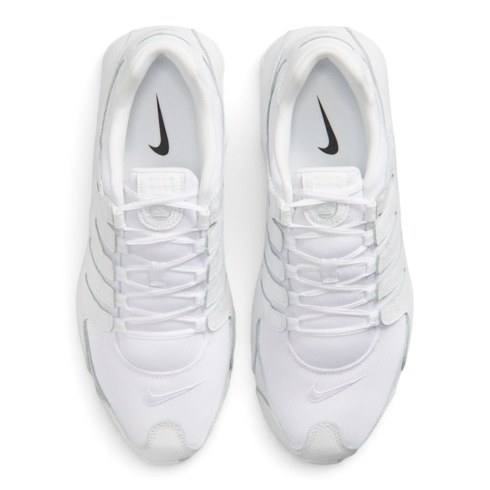 Overhead look at the shoe highlighting the white synthetic toe box, webbed ghillie lacing throat with flat white laces, breathable mesh tongue with rubberised Shox logo badge, padded white collar lining, and cushioned insole.
