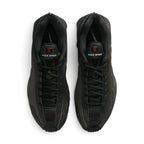 Direct overhead look at both shoes, displaying the streamlined synthetic toe wrap, breathable mesh vamp inserts, central lacing system with flat black laces, padded tongue with Shox emblem, and dark cushioned footbed.