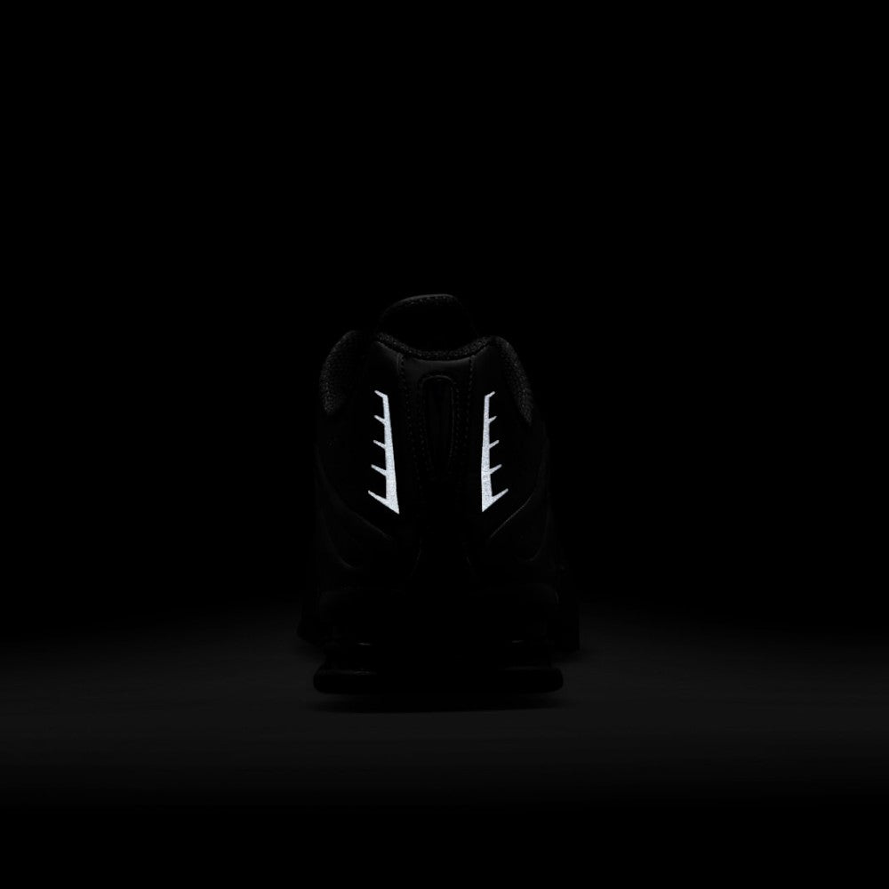 Reflective highlights on the heel of the shoe