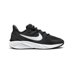 Capturing the streamlined junior running silhouette, detailing the black vertical mesh upper, white lateral Swoosh logo, synthetic toe overlay, sculpted white foam midsole, and dark rubber outsole profile.