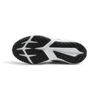 Focusing on the durable multi-surface rubber outsole featuring generative traction grooves and wrapped toe bumper, showcasing the grip matrix engineered for a successful tackle of tarmac, playground grass, and gravel paths.