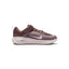 Displays the full lateral silhouette featuring the Tattoo purple mesh upper, the secure hook-and-loop top strap over elastic laces, the contrasting Pink Foam side Swoosh, the thick ComfiRide foam midsole, and the durable rubber outsole.
