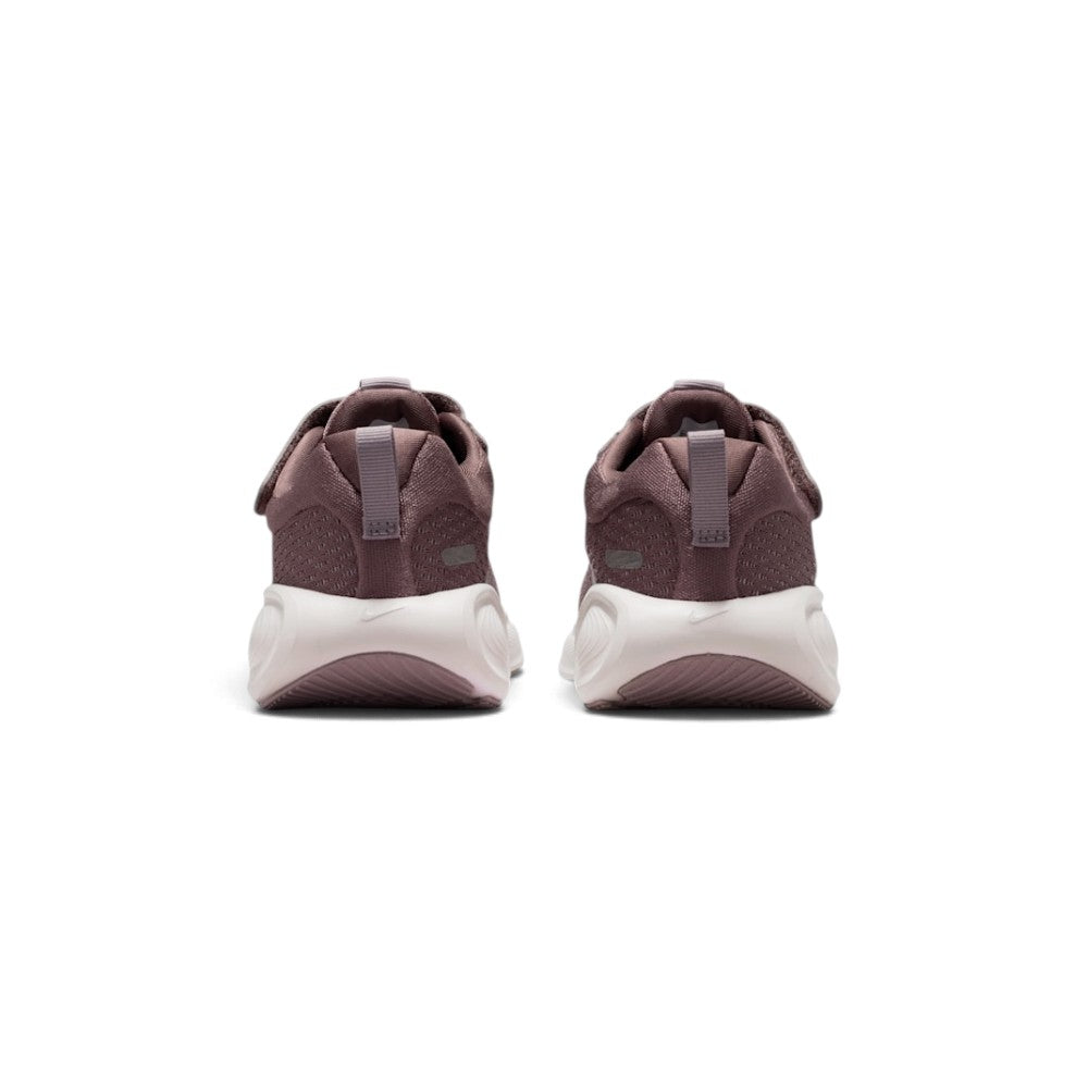 Close-up rear angle focusing on the supportive heel counters, vertical pull tabs for easy entry, curved white-to-purple midsole stack, and the rear ground contact footprint.