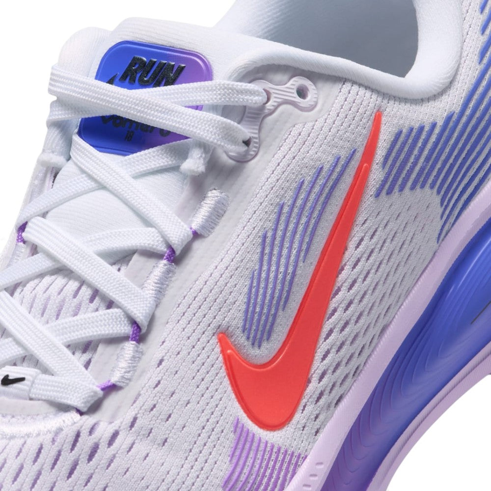 Details the micro-precision of the forefoot area, showing the open-weave white mesh toe box with "NIKE RUNNING" lateral tape, raised Hot Lava Swoosh with purple haptic line detailing, white laces, and purple-accented eyelets.