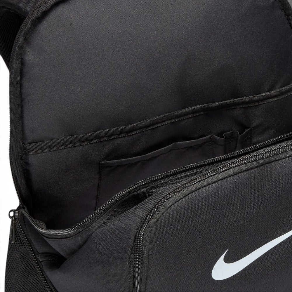 Trade Sports Nike Brasilia 9.5 black training backpack showing the open main compartment and front zip pocket