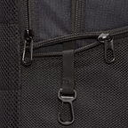 Trade Sports Nike Brasilia 9.5 backpack close-up showing black mesh pocket, zipper pulls, and gear attachment clip.