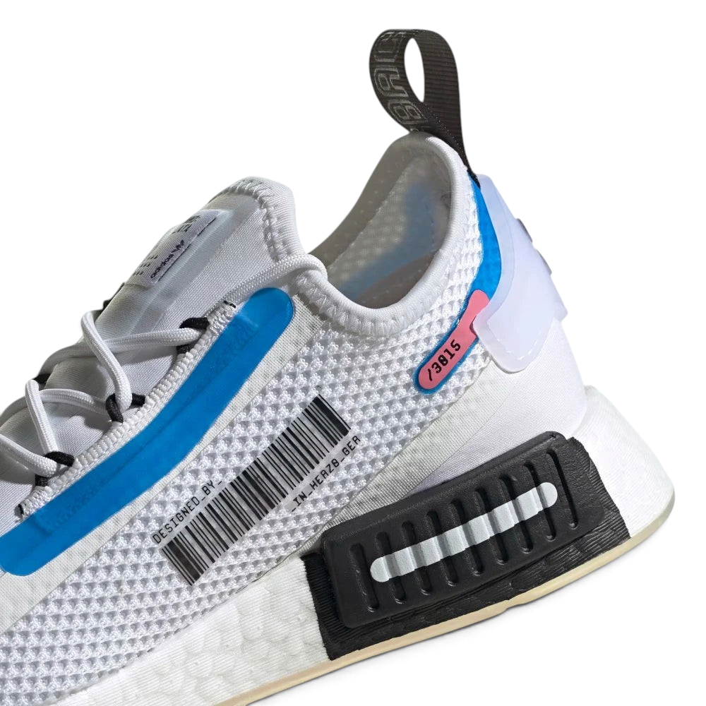 Highlights the "unreal" textured finish of the fused Boost energy capsules and the clean edge of the rubber tread.
