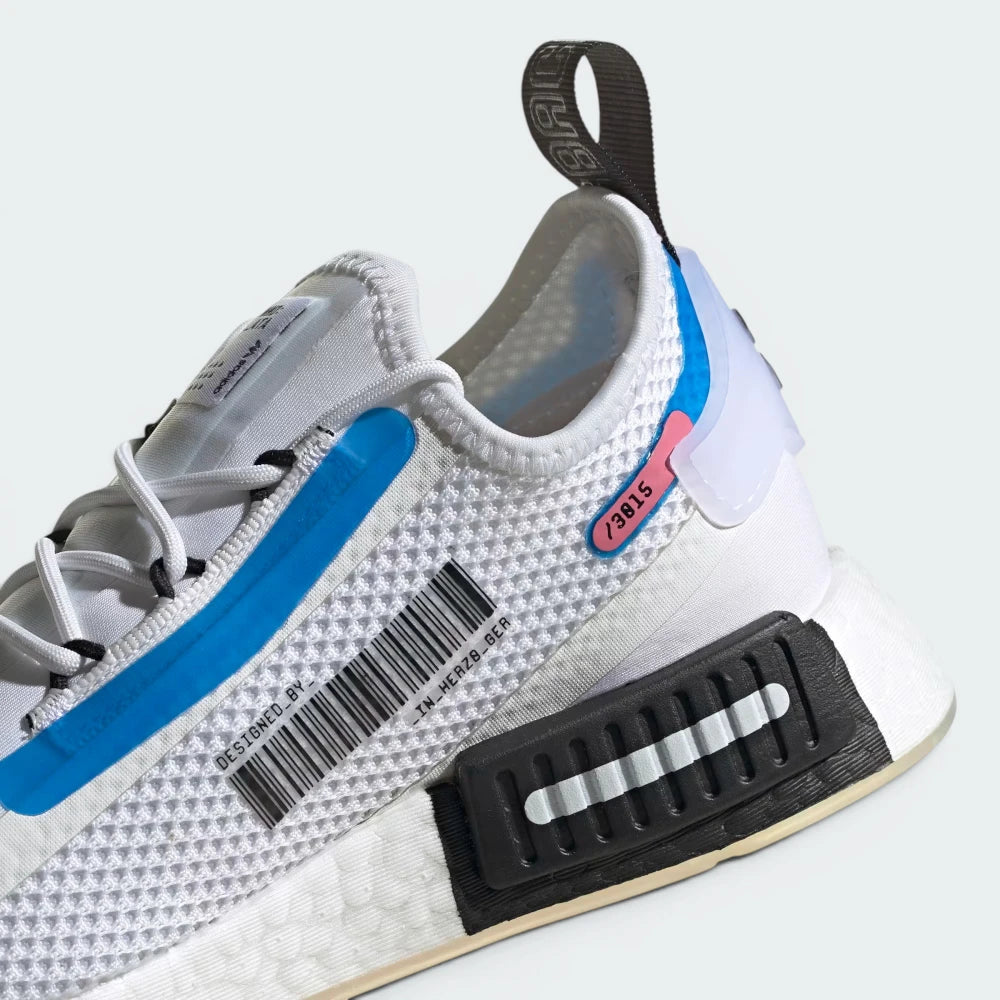Highlights the "unreal" textured finish of the fused Boost energy capsules and the clean edge of the rubber tread.