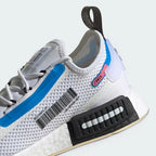 Highlights the "unreal" textured finish of the fused Boost energy capsules and the clean edge of the rubber tread.