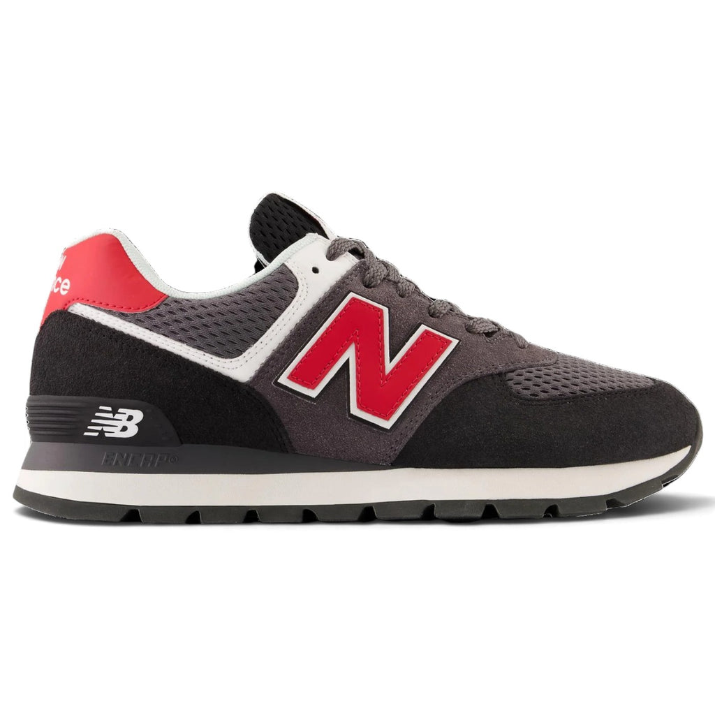 Displays the full lateral silhouette featuring the velvety black suede upper, dark grey mesh underlays, striking red leather 'N' logo with crisp white border, two-tone ENCAP cushioned foam midsole, TPU heel clip, and deep-lugged black rubber outsole.