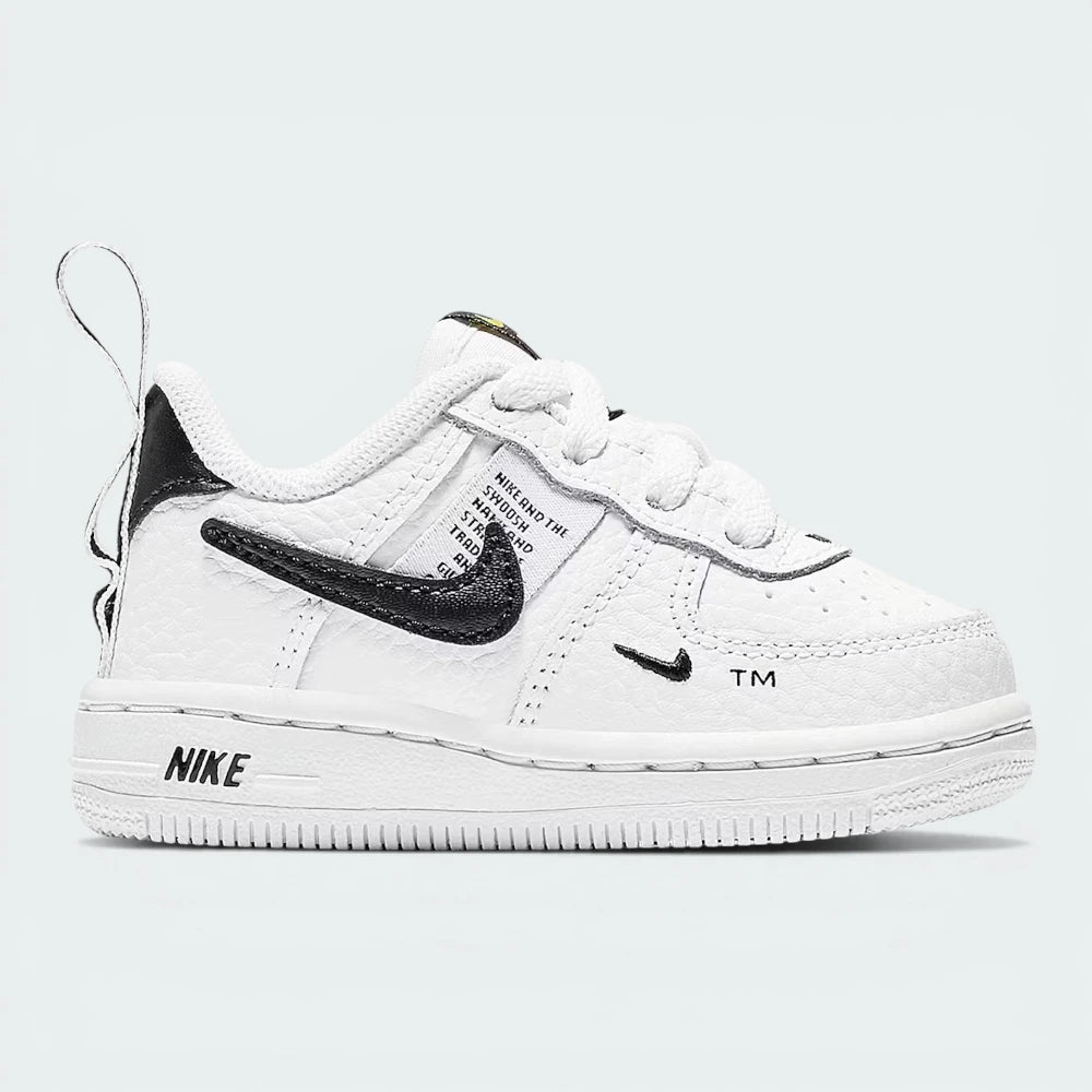 The White AF1 Utility, highlighting the Tour Yellow pull tab and the high-contrast black Swoosh.