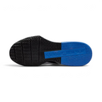View of the outsole of the Nike Air Max Alpha Training Shoes Men's white, showing the durable rubber tread pattern for multi-directional gym traction.