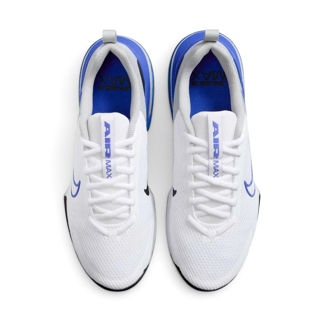 Top-down view of a pair of Nike Air Max Alpha Training Shoes Men's in white, highlighting their sturdy silhouette and lace-up closure.