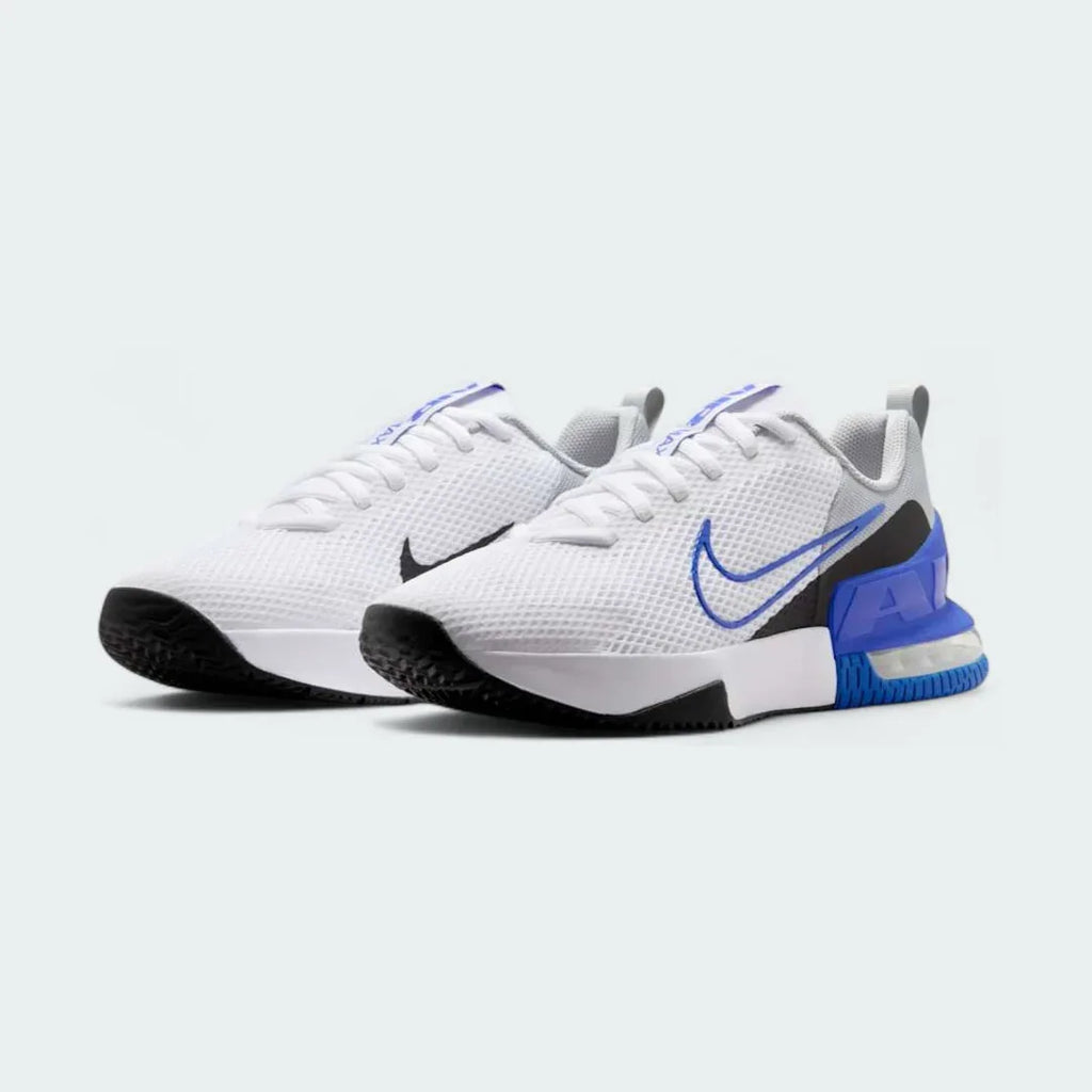 Angled view of two Nike Air Max Alpha Training Shoes Men's in white and black, side by side, showcasing their robust design and stable platform.