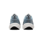 Focuses on the rear profile, highlighting the supportive grey heel counter, heel pull loop, and the wide footprint of the sculpted foam midsole base.