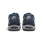 Rear view of the sneakers emphasising the heel counters, visible Max Air windows, and textured sole wraps.
