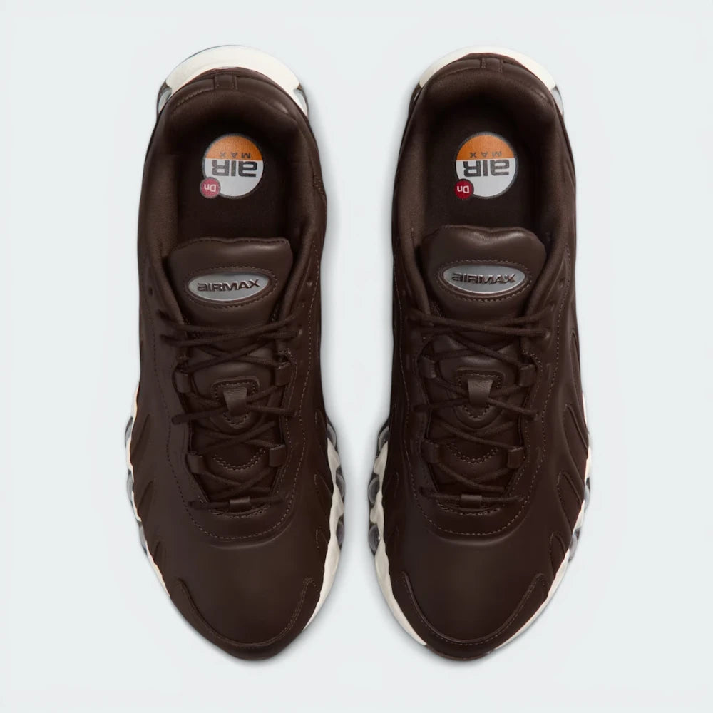 Top-Down View of Pair: Looking down at the tonal leather lacing system and the streamlined, low-profile silhouette.