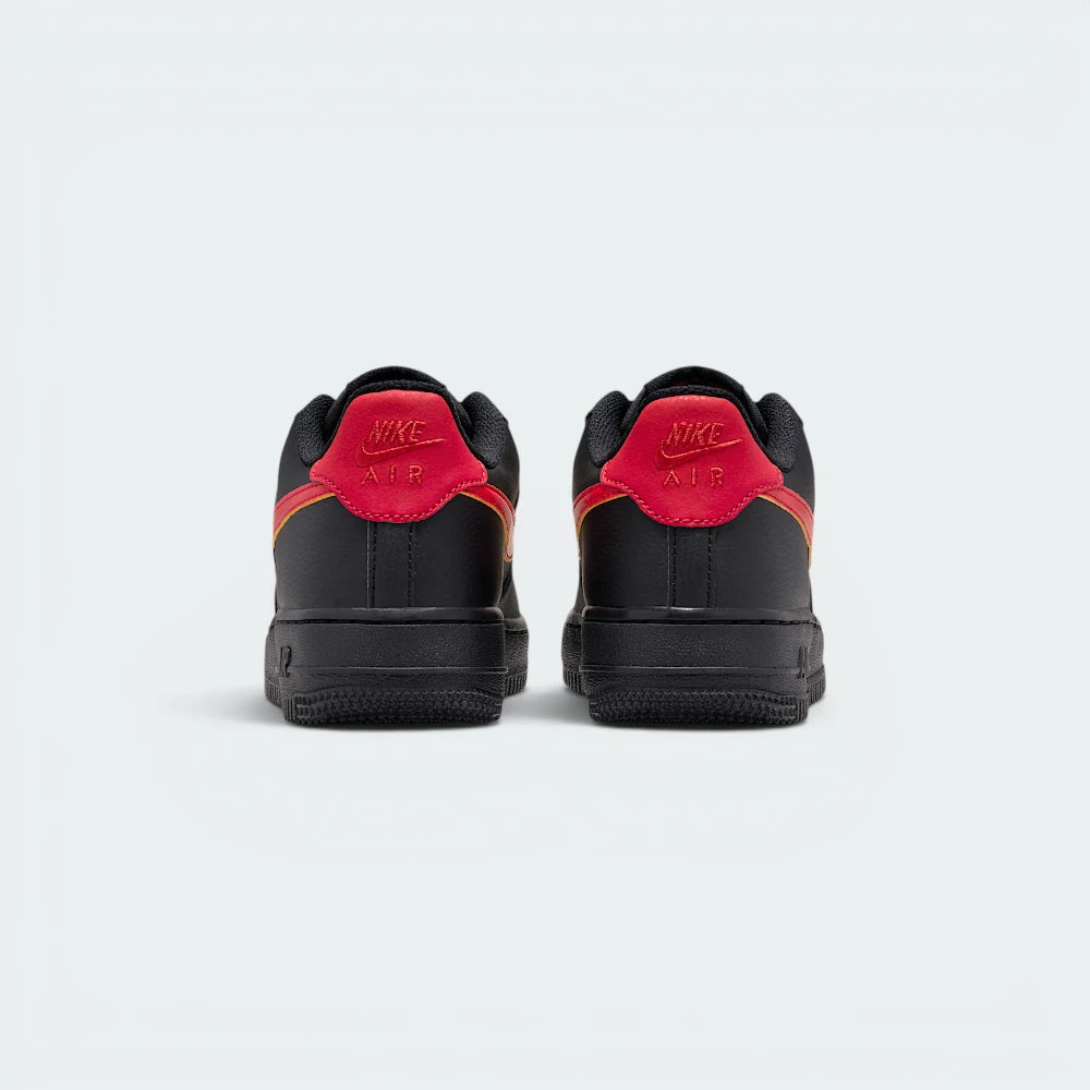 Focuses on the contoured rear heel tab featuring the embroidered Nike Air logo and the clean finish of the sole casing.