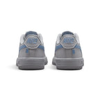 Showing the structured rear heel counter, detailing the work blue leather heel tab with embroidered grey Nike Air branding, reinforced heel overlay, and stitched cupsole base.