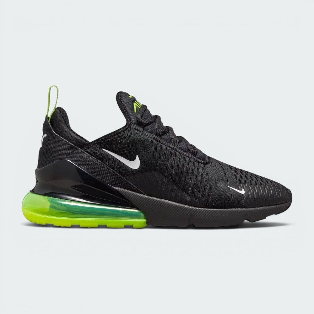Highlights the high-velocity sweep of the small white Nike Swoosh, showing the breathable black engineered mesh upper, the black heel clip, and the massive translucent Volt green 270 Max Air heel unit sitting cleanly above the black foam forefoot.