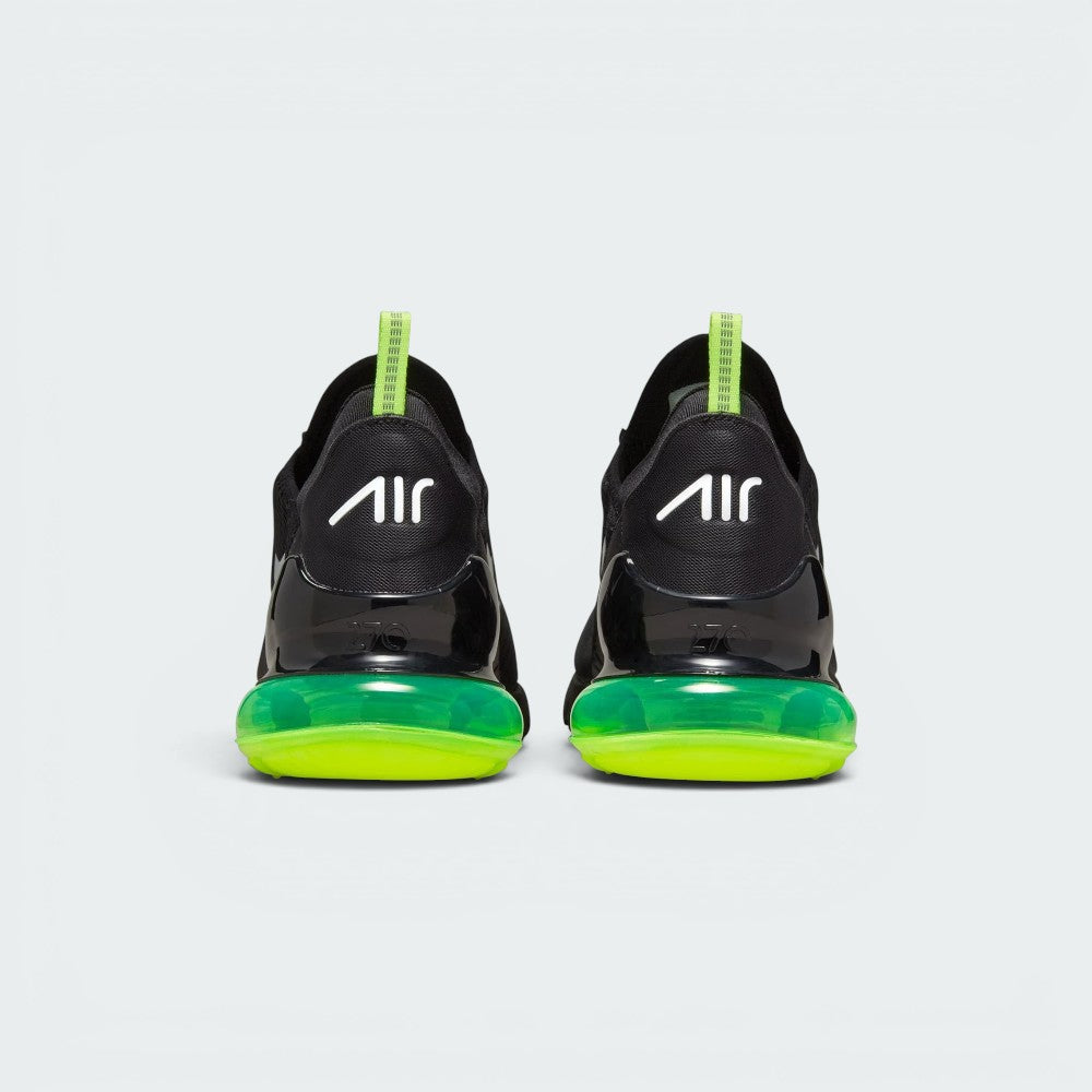 Focuses on the rear profile, highlighting the structured black heel counter stamped with white "AIR" branding, the neon Volt webbing pull tab, and the wide footprint of the translucent Volt Air bubble.