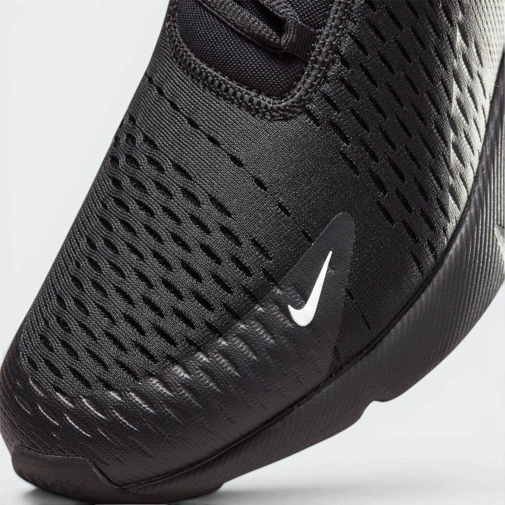 Details the micro-precision of the open-cell mesh upper, showing the seamless synthetic toe mudguard guard and the neat tracking of the white mini-Swoosh on the toe.