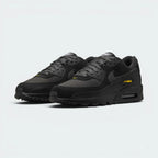 Emphasising the aggressive, forward-leaning athletic running stance and the professional distribution of the high-contrast gold panel overlays.