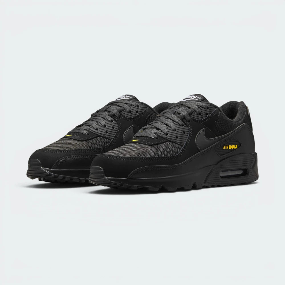 Emphasising the aggressive, forward-leaning athletic running stance and the professional distribution of the high-contrast gold panel overlays.