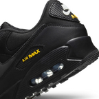 Highlights the "unreal" clean finish where the visible Air window chamber embeds securely inside the sculpted foam midsole carrier.