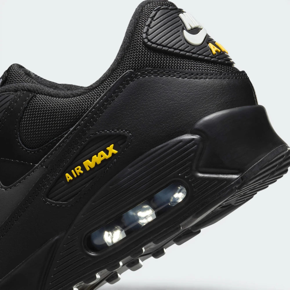 Highlights the "unreal" clean finish where the visible Air window chamber embeds securely inside the sculpted foam midsole carrier.