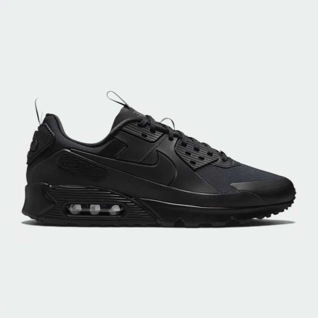 Highlights the high-velocity layered construction and the professional "Triple Black" texture depth.