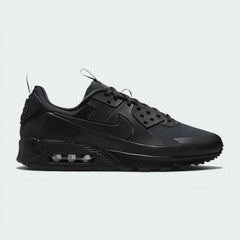 Highlights the high-velocity layered construction and the professional "Triple Black" texture depth.