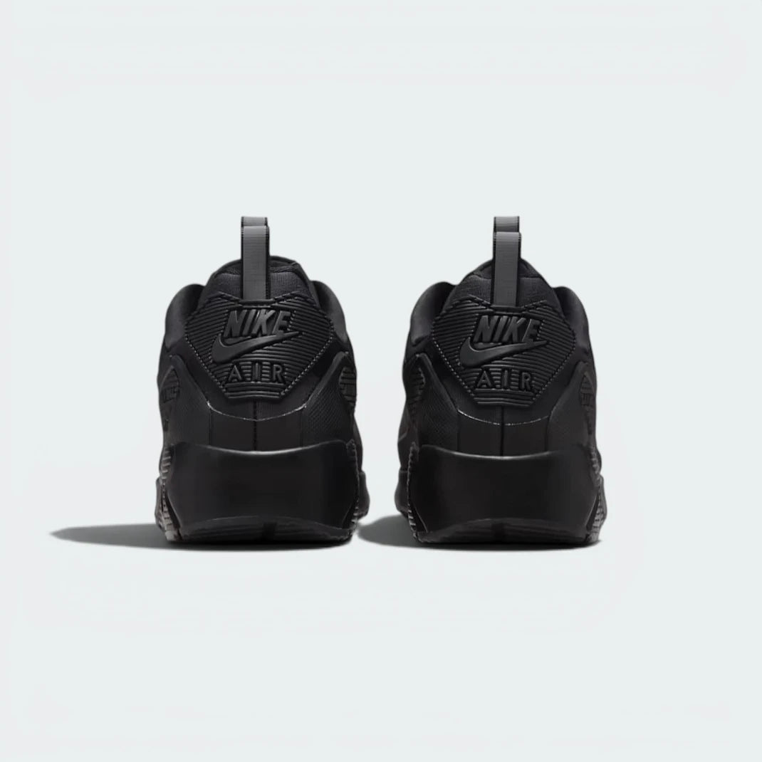 Focuses on the visible Max Air unit and the professional finish of the reinforced heel pull tab.