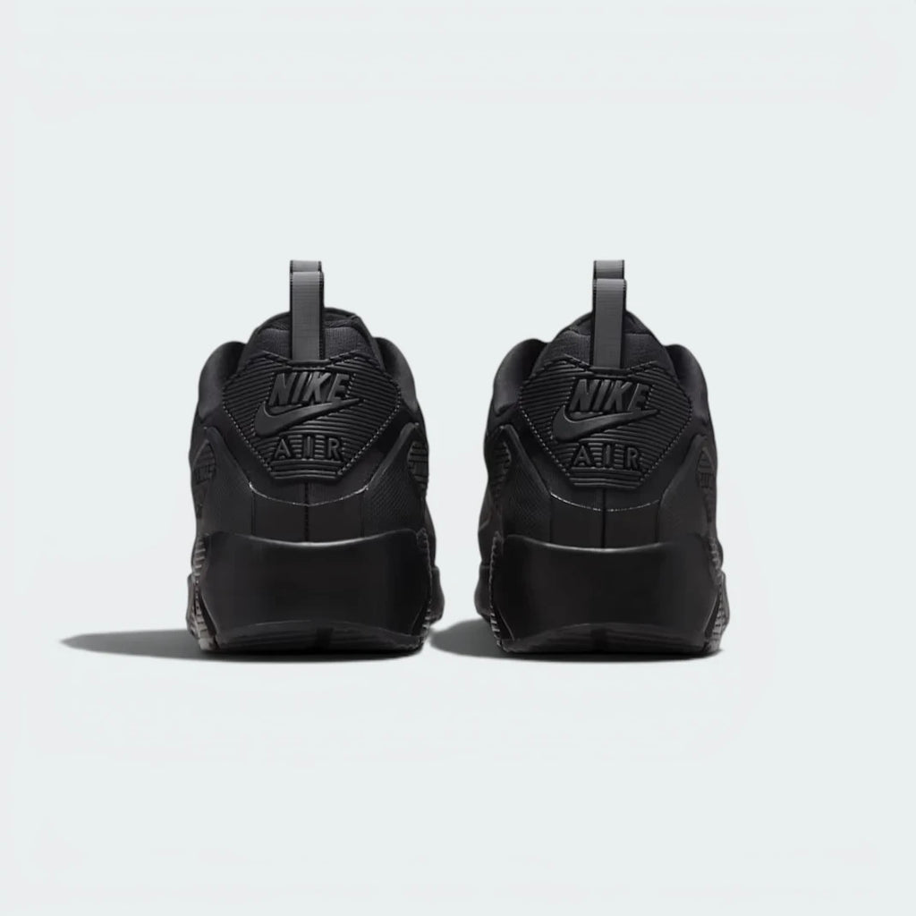 Focuses on the visible Max Air unit and the professional finish of the reinforced heel pull tab.