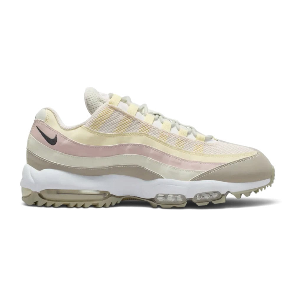 Displays the full lateral silhouette featuring the signature wavy layered synthetic upper in Spruce Fog, Alabaster, and Silt Red, an Anthracite Nike Swoosh near the heel, visible Max Air units in the midsole, and the turf-ready rubber lug outsole.
