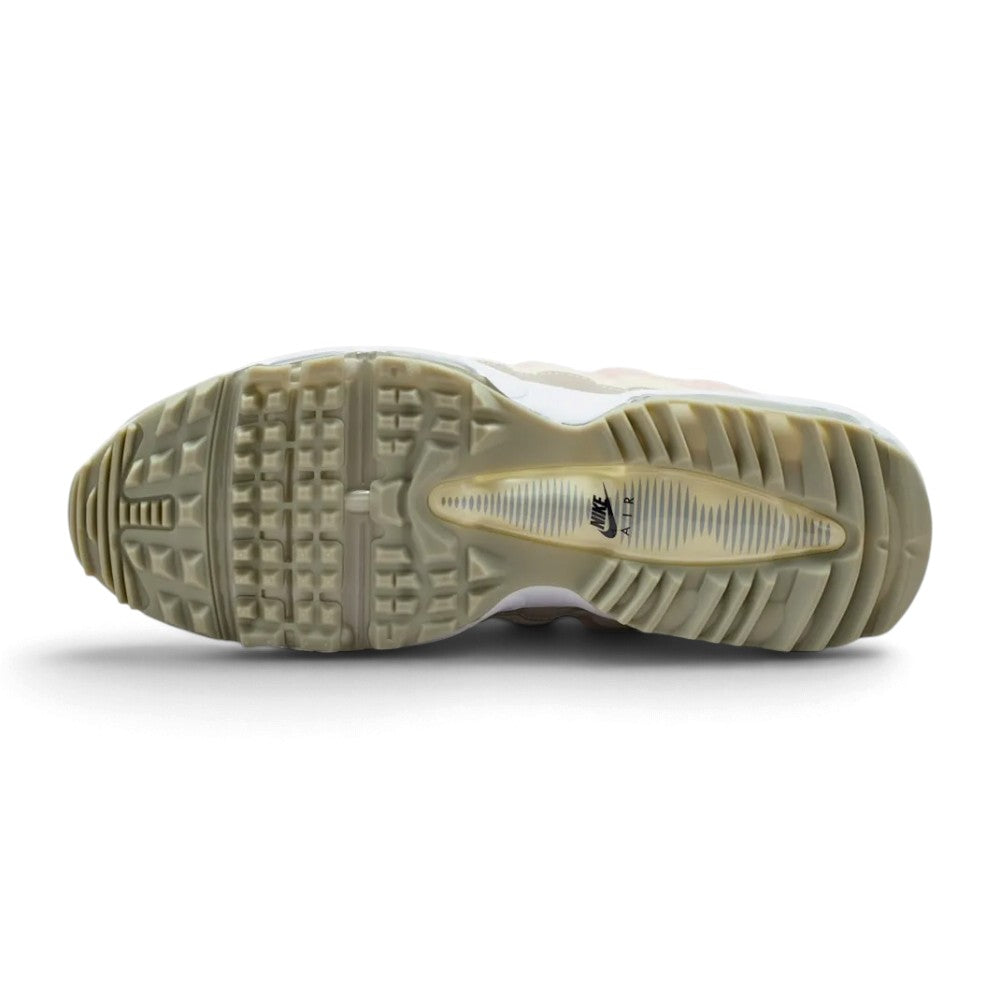 Full-length bottom profile showing the sticky rubber lug outsole, highlighting the specialized waffle-and-lug traction pattern engineered for multi-directional rotational grip on the golf course.