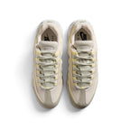 Direct overhead view of both shoes laid flat, showcasing the mesh tongue panels, anatomical webbed lace loops threaded with tonal laces, branded insoles, and streamlined toe box proportions.